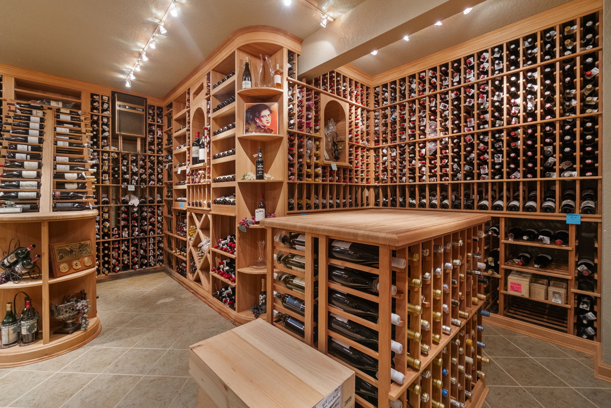 Calling all Wine Enthusiasts. This Custom Built Home has the Wine Cellar of Your Dreams!